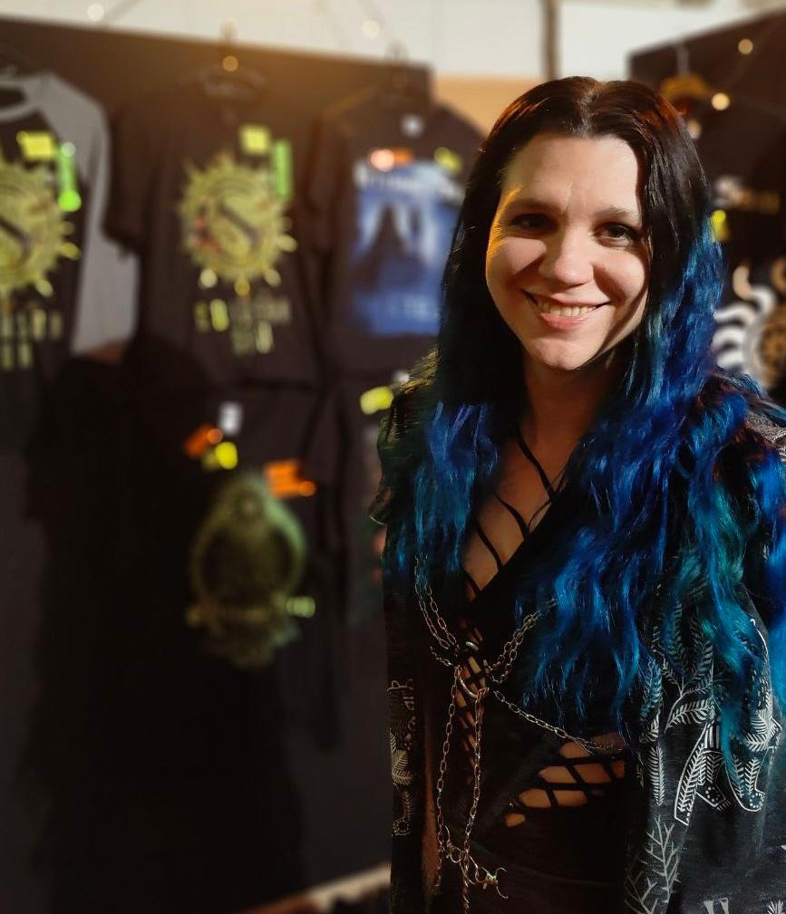 Close up of Chrissy working at a gig.